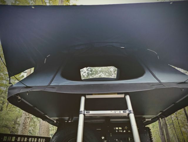 Ushi Tentbox Looking Up with Ladder.jpg